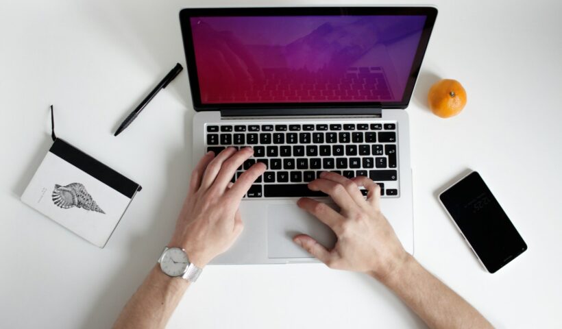 person using laptop computer