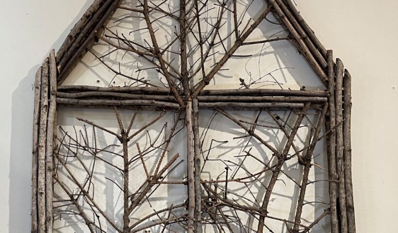 a picture of a window made out of branches